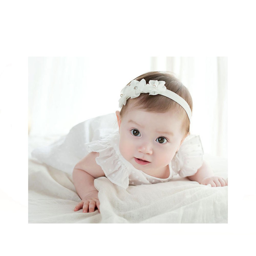 white infant headband